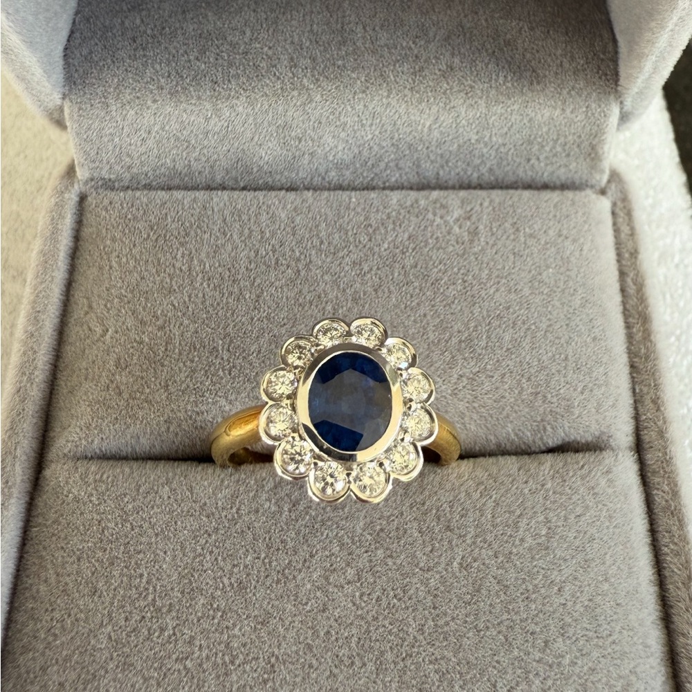 Garrard Blue Oval Sapphire & Diamond Ring